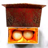 Qi-Gong Kugeln aus Stein, marmoriert orange